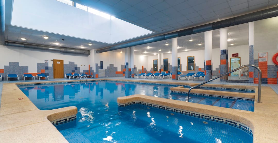 A photo of an indoor swimming pool for a winter sun holiday deals black friday.