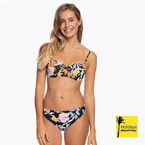 A photo of a girl wearing ROXY Womens Beach Classics Bandeau Bikini Set.